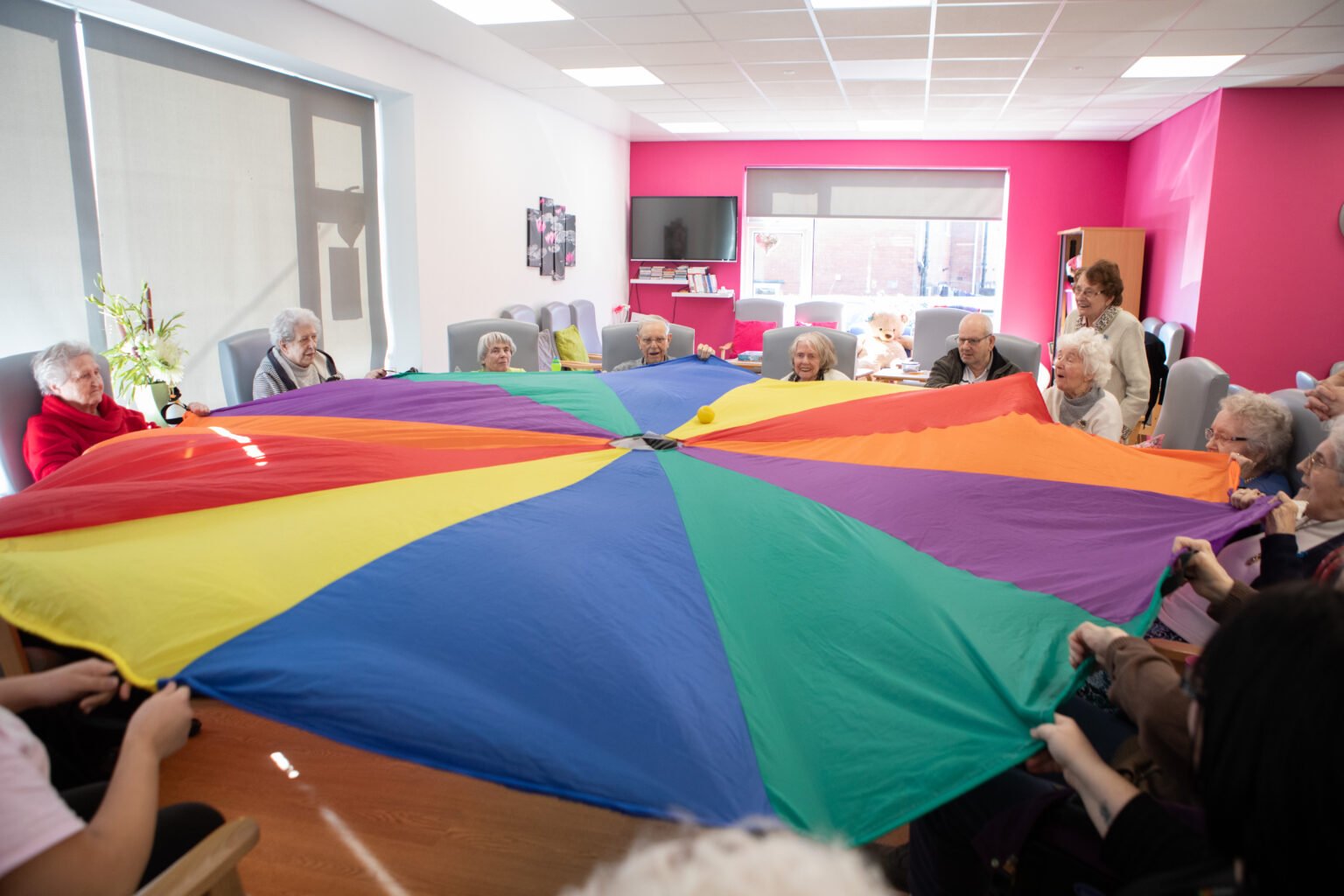 People playing the parachute game