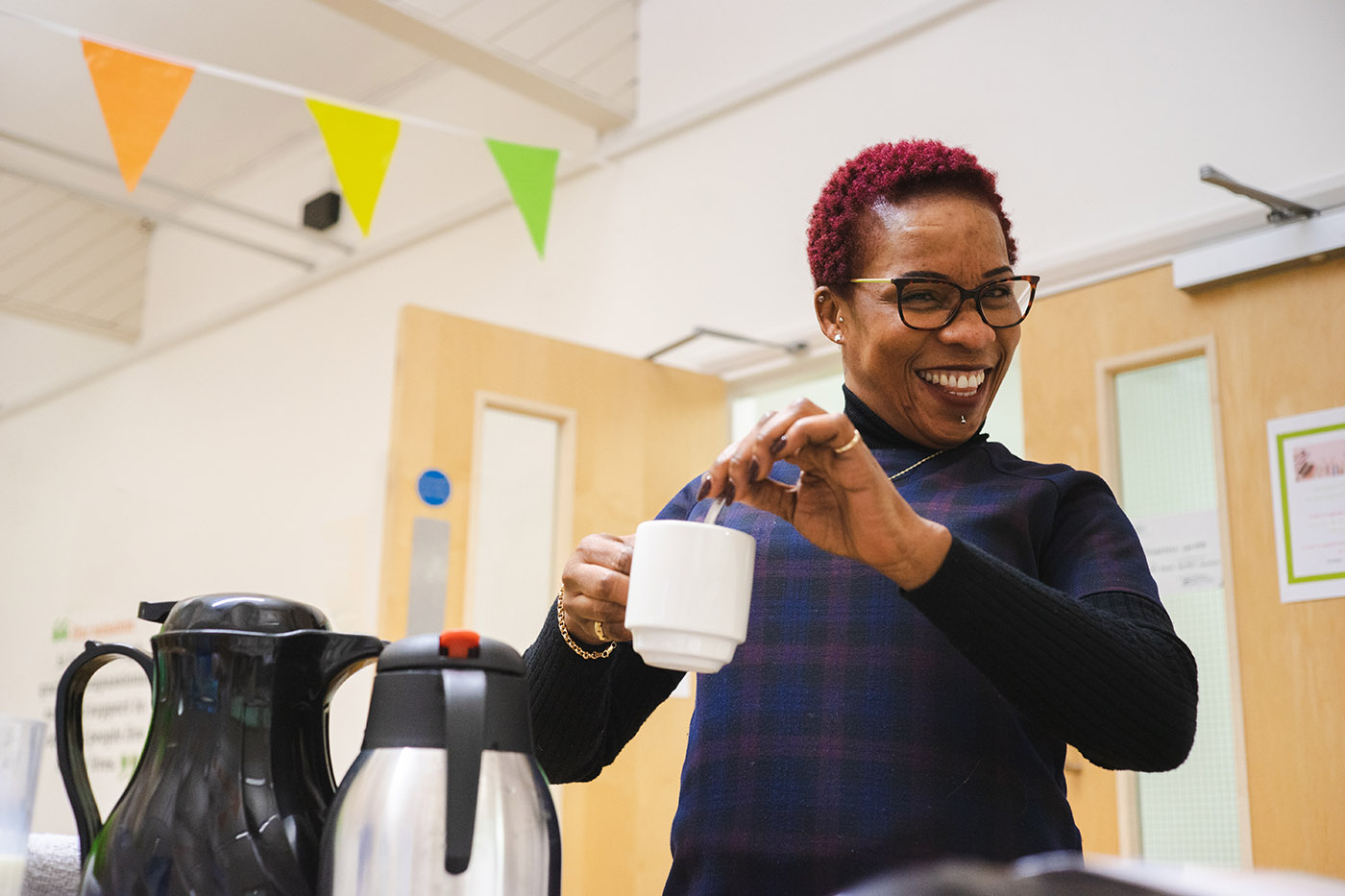 member of staff making a cup of tea