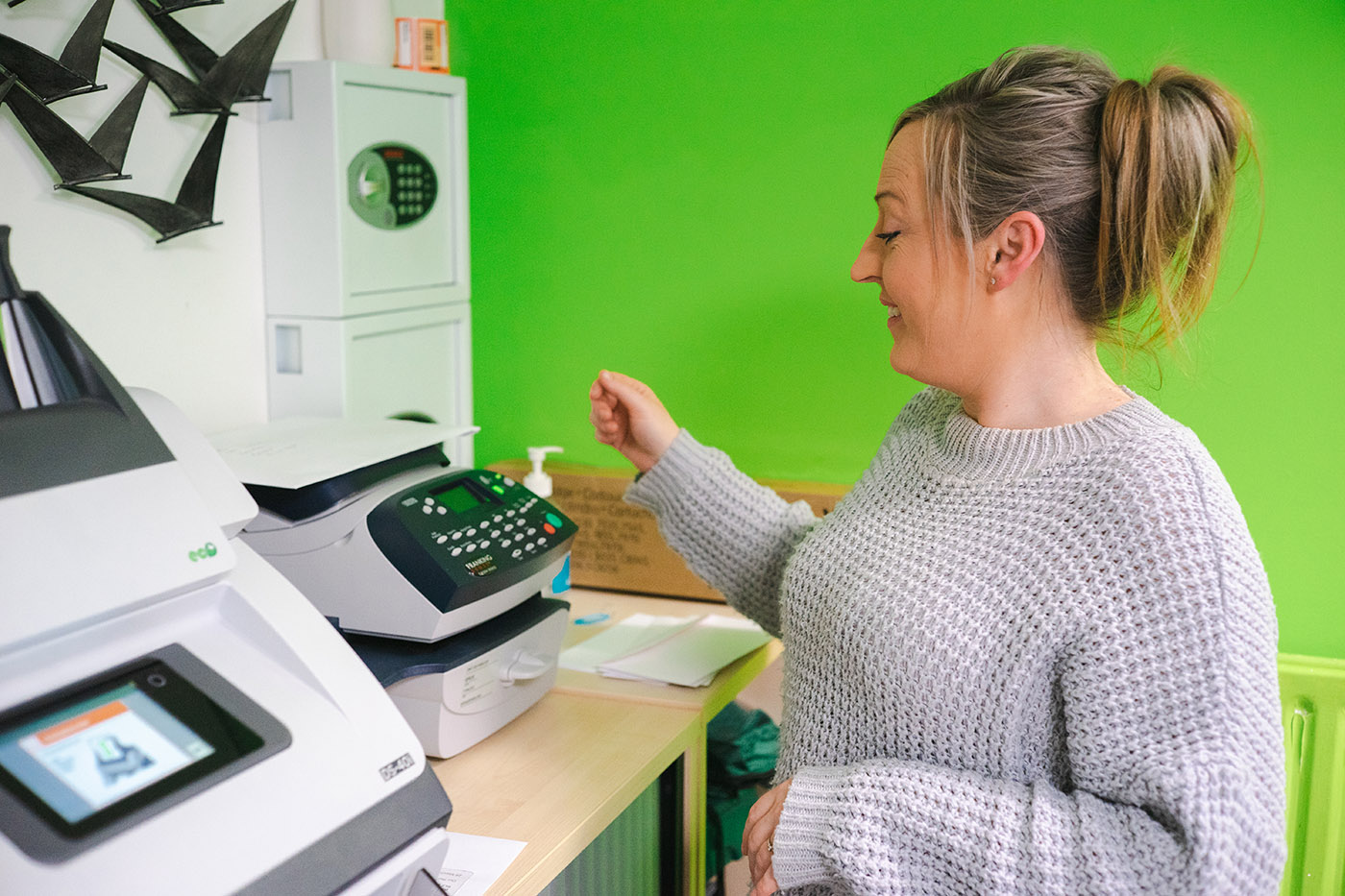 Staff member using the photocopier